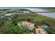 Condo aerial view featuring waterfront access and nearby commercial area at 4247 Faber Place Dr # 5103, North Charleston, SC 29405