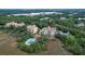 Scenic condos nestled among trees with a pool, offering serene living at 4247 Faber Place Dr # 5103, North Charleston, SC 29405