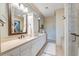 Bright bathroom features double vanity, soaking tub, neutral tile, and decorative accents at 4247 Faber Place Dr # 5103, North Charleston, SC 29405