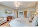 Bright bedroom with an ensuite bathroom and calming light-blue walls at 4247 Faber Place Dr # 5103, North Charleston, SC 29405