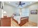Charming bedroom features hardwood floors, plantation shutters, and calming paint at 4247 Faber Place Dr # 5103, North Charleston, SC 29405
