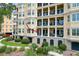 Exterior view of the condo building with balconies, showcasing outdoor living spaces and architectural features at 4247 Faber Place Dr # 5103, North Charleston, SC 29405
