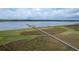 Long wooden walkway over marshland leads to a private boat dock at 4247 Faber Place Dr # 5103, North Charleston, SC 29405