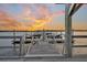 Scenic dock with boat slips, providing convenient access to the water and beautiful sunset views at 4247 Faber Place Dr # 5103, North Charleston, SC 29405