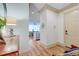 Inviting foyer with wood floors, an entry table and decorative accents at 4247 Faber Place Dr # 5103, North Charleston, SC 29405