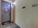 Apartment hallway with unit numbers, lighting fixtures, and a welcome mat at 4247 Faber Place Dr # 5103, North Charleston, SC 29405