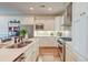 Bright kitchen featuring custom cabinets, stainless steel appliances, and a gas range at 4247 Faber Place Dr # 5103, North Charleston, SC 29405