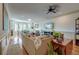 Spacious living room with hardwood floors, ceiling fan, recessed lighting, and access to dining area at 4247 Faber Place Dr # 5103, North Charleston, SC 29405