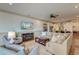Inviting living room featuring comfortable seating, fireplace, and seamless transition to the kitchen at 4247 Faber Place Dr # 5103, North Charleston, SC 29405
