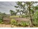Picturesque marsh view showcasing natural vegetation with beautiful oak trees, providing a peaceful and scenic vista at 4247 Faber Place Dr # 5103, North Charleston, SC 29405