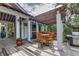 Stylish outdoor kitchen with covered seating, a grill, and a TV, ideal for entertaining guests in a relaxed setting at 4247 Faber Place Dr # 5103, North Charleston, SC 29405