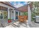 Stylish outdoor kitchen with covered seating, a grill, and a TV, ideal for entertaining guests in a relaxed setting at 4247 Faber Place Dr # 5103, North Charleston, SC 29405