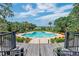 Resort-style pool with lounge chairs and a scenic view, perfect for relaxation and enjoying the outdoors at 4247 Faber Place Dr # 5103, North Charleston, SC 29405