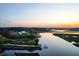 Scenic aerial view of the property with a community dock on the water at 4281 Jacobs Point Ct, Ravenel, SC 29470