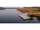 Aerial view of a dock and gazebo on a river at 4281 Jacobs Point Ct, Ravenel, SC 29470