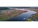 Marsh view from the water with community dock access and mature landscaping at 4281 Jacobs Point Ct, Ravenel, SC 29470