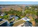 Panoramic aerial view of a residential area near marshlands, blending community with the natural environment at 4281 Jacobs Point Ct, Ravenel, SC 29470