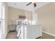 Bright bedroom with a ceiling fan, shuttered windows, and a queen size bed at 4281 Jacobs Point Ct, Ravenel, SC 29470