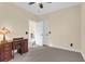 Light-filled bedroom with ceiling fan, neutral walls and trim, and carpeted floors at 4281 Jacobs Point Ct, Ravenel, SC 29470