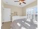 Inviting bedroom with neutral tones, plantation shutters, and a comfortable queen size bed at 4281 Jacobs Point Ct, Ravenel, SC 29470