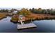 Community dock view with marsh land and surrounding mature trees at 4281 Jacobs Point Ct, Ravenel, SC 29470