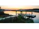 Picturesque dock and gazebo area on the marsh with beautiful sunset view over the calming waterway at 4281 Jacobs Point Ct, Ravenel, SC 29470