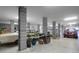 Spacious multi-car garage with exposed support beams and ample natural light at 4281 Jacobs Point Ct, Ravenel, SC 29470