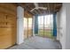 Bright and airy screened porch with views of the outdoor landscape and wooden details at 4281 Jacobs Point Ct, Ravenel, SC 29470