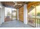Screened-in back porch showcasing an outdoor ceiling fan and view of the backyard at 4281 Jacobs Point Ct, Ravenel, SC 29470