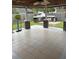 Covered patio offers an outdoor kitchen and tiled flooring for entertaining and relaxing at 429 Stephanie Dr, Goose Creek, SC 29445