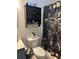 Bathroom featuring a black cabinet with shelf and moth themed shower curtain at 429 Stephanie Dr, Goose Creek, SC 29445