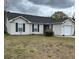 Charming single-story home with a well-maintained lawn and neutral siding at 429 Stephanie Dr, Goose Creek, SC 29445
