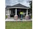 Backyard patio features white columns with brick bases, and lots of space for play at 429 Stephanie Dr, Goose Creek, SC 29445