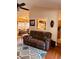 Comfortable living room with hardwood floors, large sofa, and dining area in view at 429 Stephanie Dr, Goose Creek, SC 29445