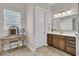 Bathroom with a vanity, a large mirror, and a makeup table at 458 Four Seasons Blvd, Summerville, SC 29486