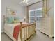 Bedroom featuring carpet, a window, and a brass bed frame at 458 Four Seasons Blvd, Summerville, SC 29486