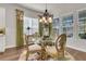 Dining area with a round table, elegant chairs, and bright natural light at 458 Four Seasons Blvd, Summerville, SC 29486