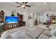 Spacious living room with an entertainment center, large sectional sofa, and neutral decor at 458 Four Seasons Blvd, Summerville, SC 29486