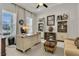 Comfortable office with built-in shelves, large desk, and a large window at 458 Four Seasons Blvd, Summerville, SC 29486