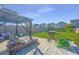 Backyard featuring a gazebo, patio, outdoor seating, grill, and lush lawn with a fountain at 458 Whispering Breeze Ln, Summerville, SC 29486