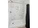 Stylish bathroom with marble-look tiled shower and gold fixtures at 5020 Holdsworth Dr, Summerville, SC 29485