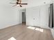 Clean bedroom with a ceiling fan and doorway to another room at 5020 Holdsworth Dr, Summerville, SC 29485