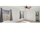 Well-lit bedroom featuring a ceiling fan and two windows at 5020 Holdsworth Dr, Summerville, SC 29485