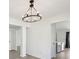 Bright entryway with a modern chandelier and neutral walls at 5020 Holdsworth Dr, Summerville, SC 29485