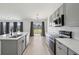 Modern kitchen with stainless steel appliances, a center island, and gray cabinets at 5020 Holdsworth Dr, Summerville, SC 29485