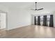 Bright living room featuring modern flooring and multiple windows with natural light at 5020 Holdsworth Dr, Summerville, SC 29485