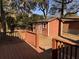 Cozy back deck with view of yard shed and fence at 5310 Edith St, North Charleston, SC 29418