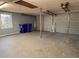 Spacious two car garage with concrete floors and overhead door openers at 5310 Edith St, North Charleston, SC 29418