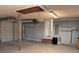 Spacious two car garage with concrete floors and overhead door openers at 5310 Edith St, North Charleston, SC 29418