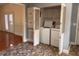 Convenient laundry area featuring a washer, dryer, and ample storage cabinets at 5310 Edith St, North Charleston, SC 29418